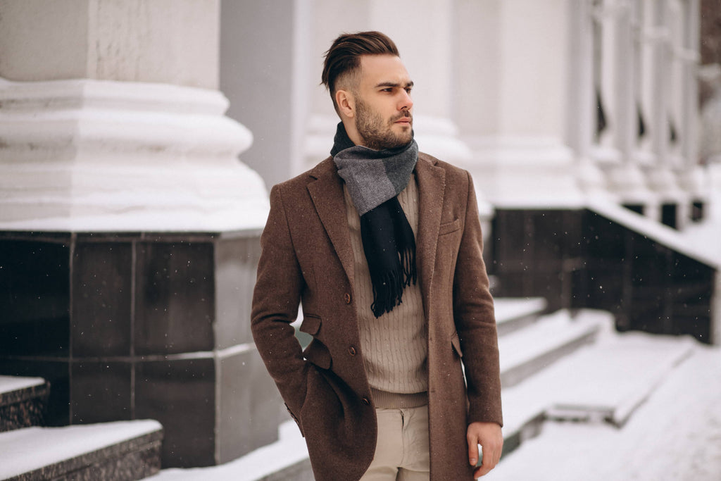 handsome young business man in a trench coat