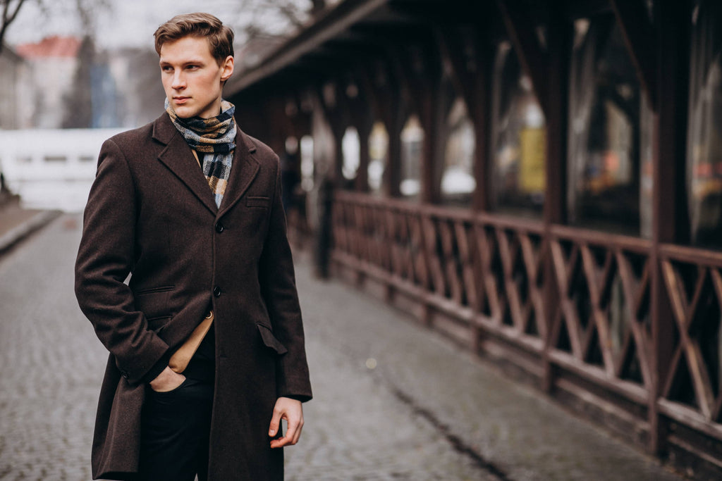 young handsome man coat outside street