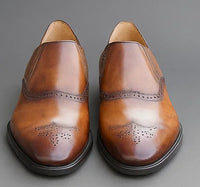 Carrucci Slip-on Loafer with medallion
